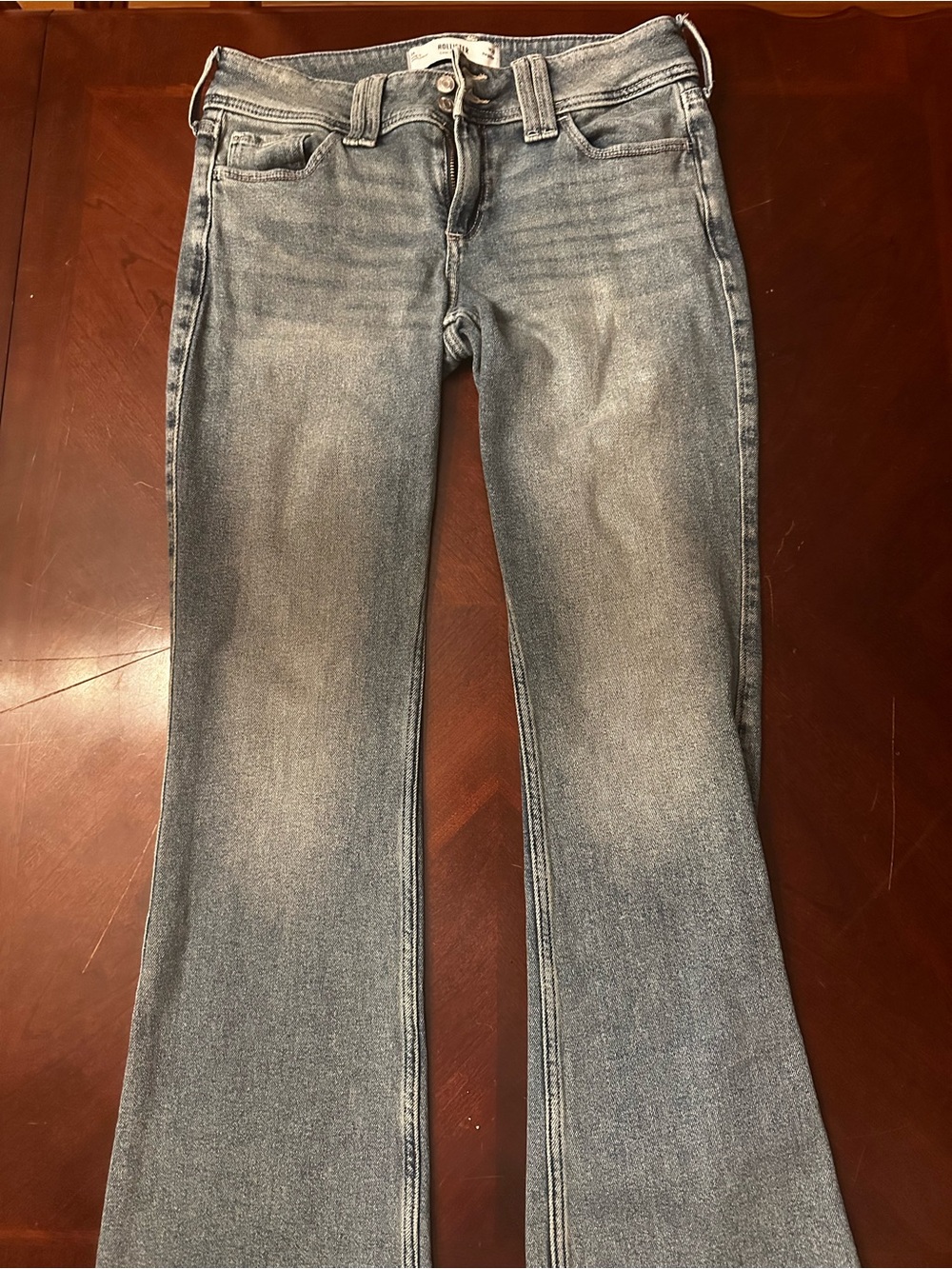 Holister brand new light wash jeans, with cute pocket pattern